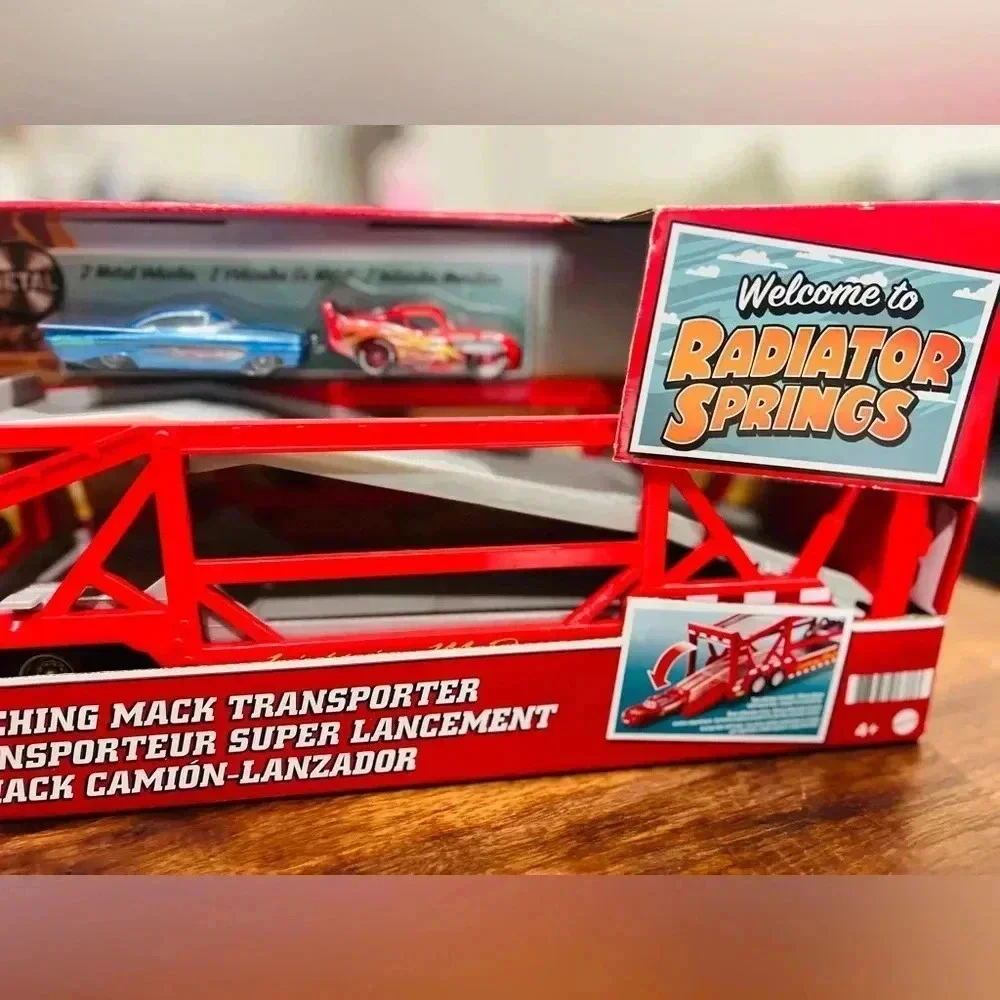 Disney Pixar Cars Launching Mack Transporter Truck Playset - Red Dinoco Transpor